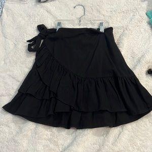 girls black ruffle mini skirt
